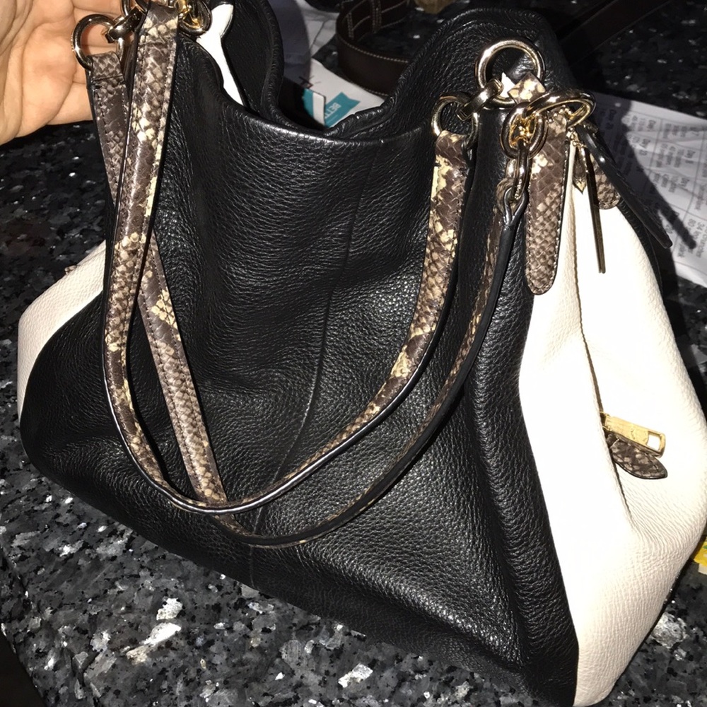 Coach black and white snake skin shoulder bag.